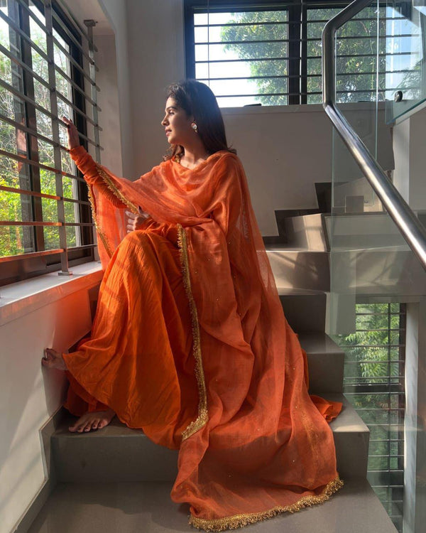 Peaceful Orange Color Chinnon Silk Anarkali Gown