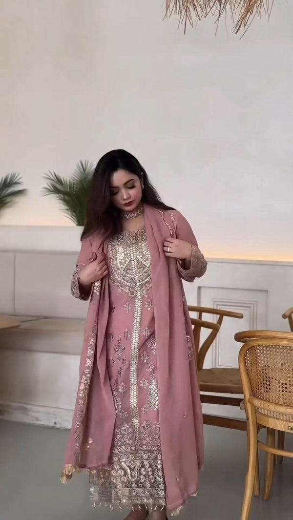 Demanding Embroidery Sequence Work Peach Color Anarkali Suit