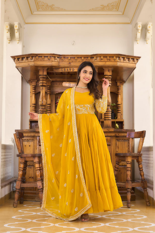Delightful Ruffle Style Yellow Color Sequence Work Gown