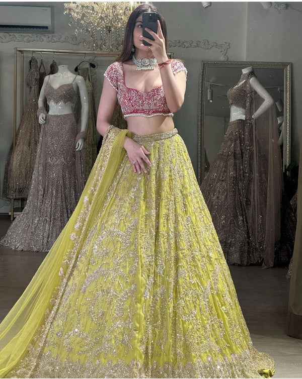 Engagement Wear Lemon Color Heavy Work Lehenga Choli