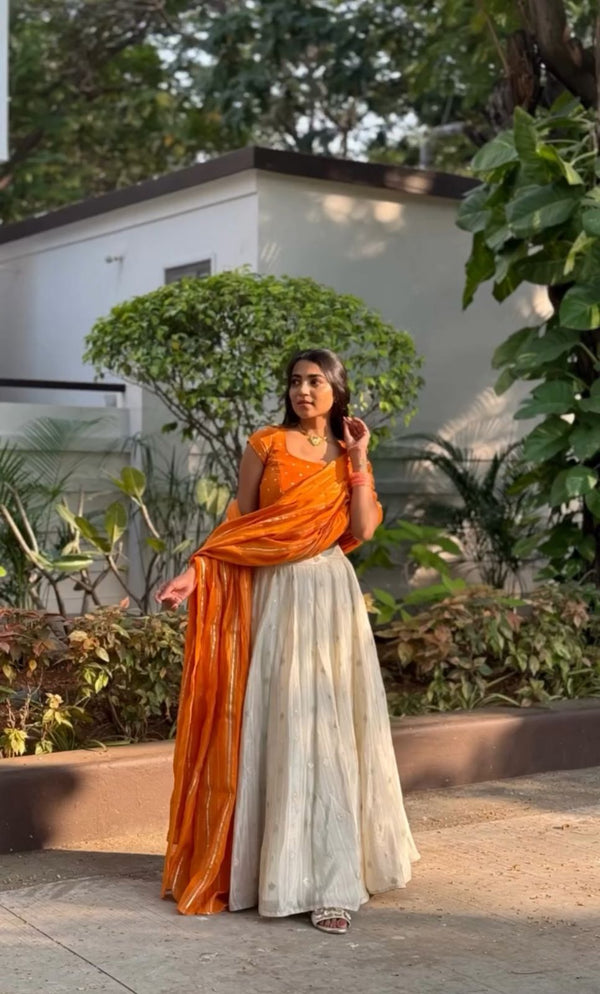 Jacquard Silk Adorable Orange Choli With White Lehenga