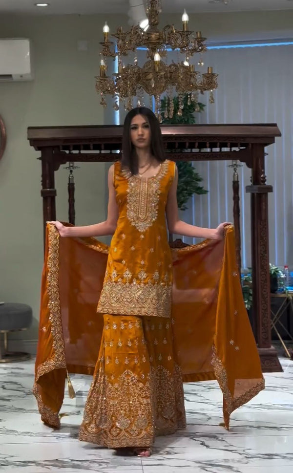 Charming Georgette Mustard Color Sharara Suit