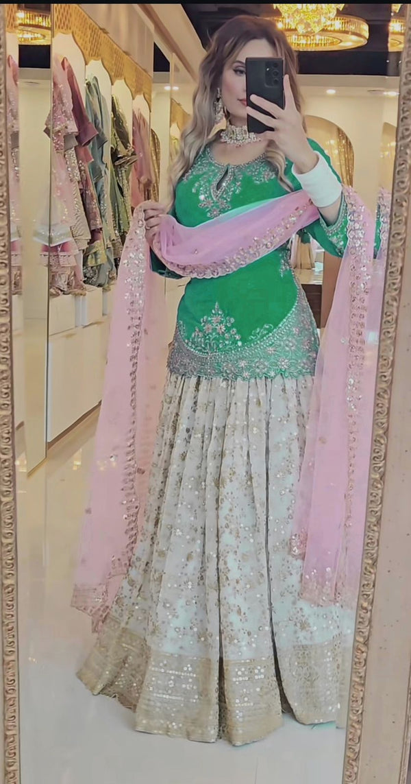 Traditional Wear Embroidery Work Green Color Top With Lehenga