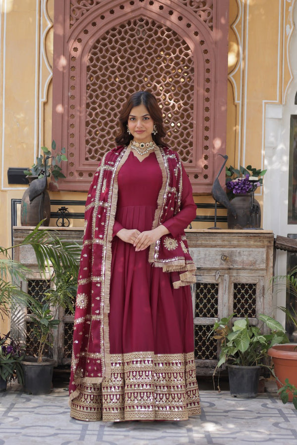 Presenting Embroidery Zari Sequins Work Maroon Color Gown With Dupatta