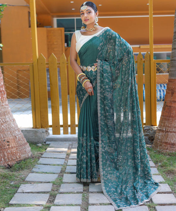 Captivating Silk Floral Design Teal Green Color Saree