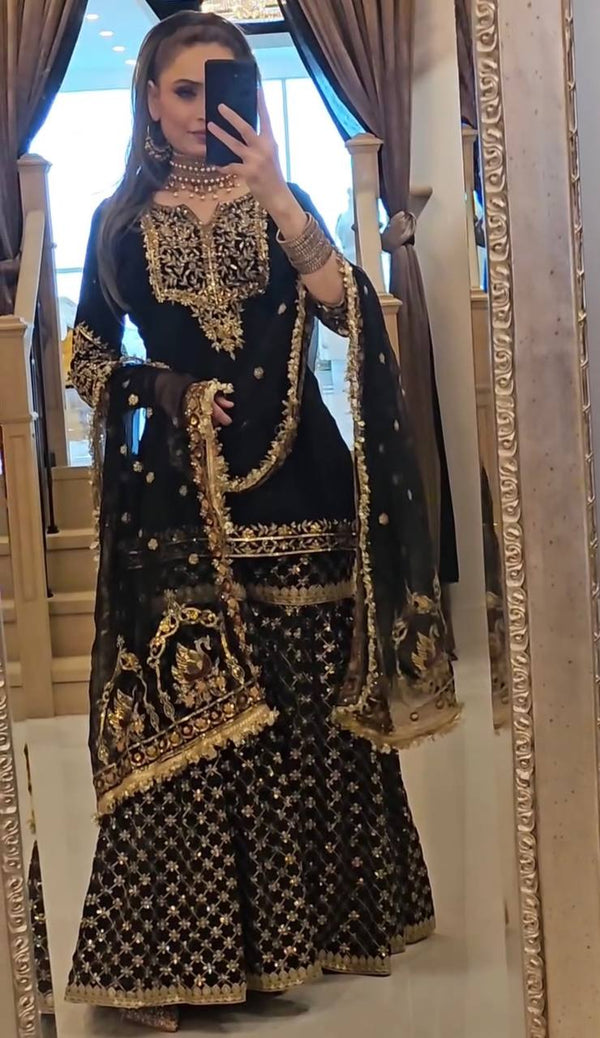 Fabulous Georgette Black Color Sharara Suit