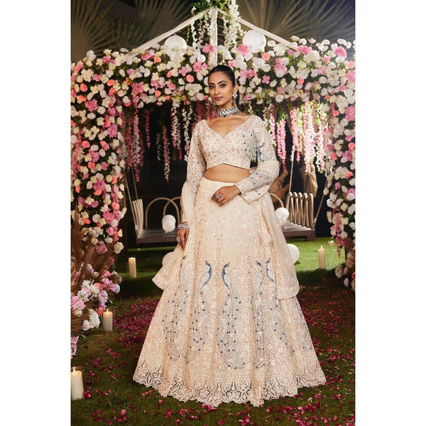 Bridal Wear Heavy Work Cream Color Lehenga Choli