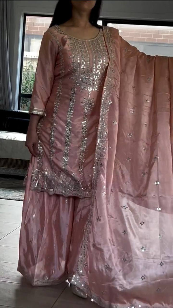 Demanding Embroidery Work Peach Color Sharara Suit