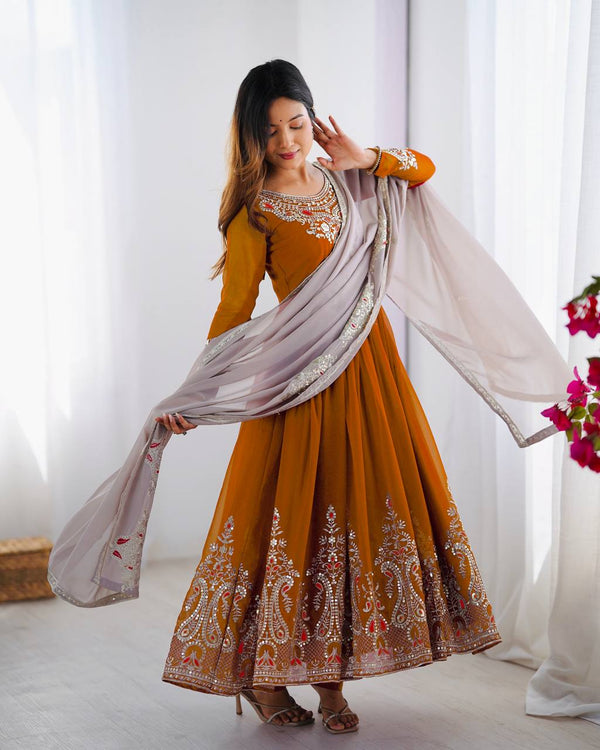 Imposing Orange Color Gown With White Dupatta