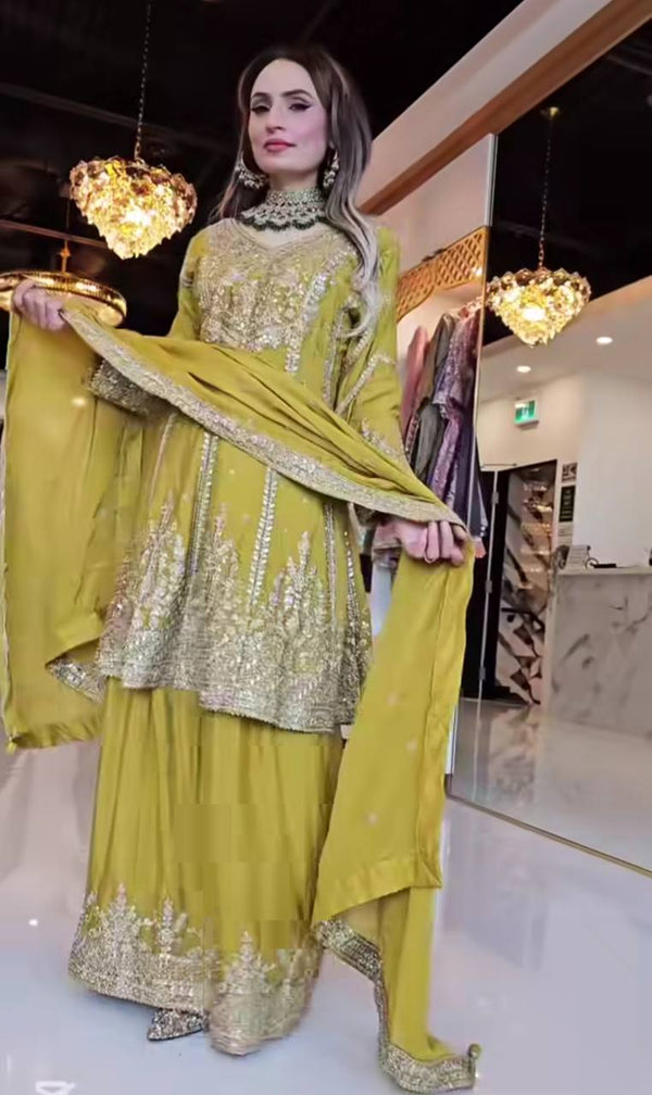 Flattering Yellow Color Heavy Work Sharara Suit