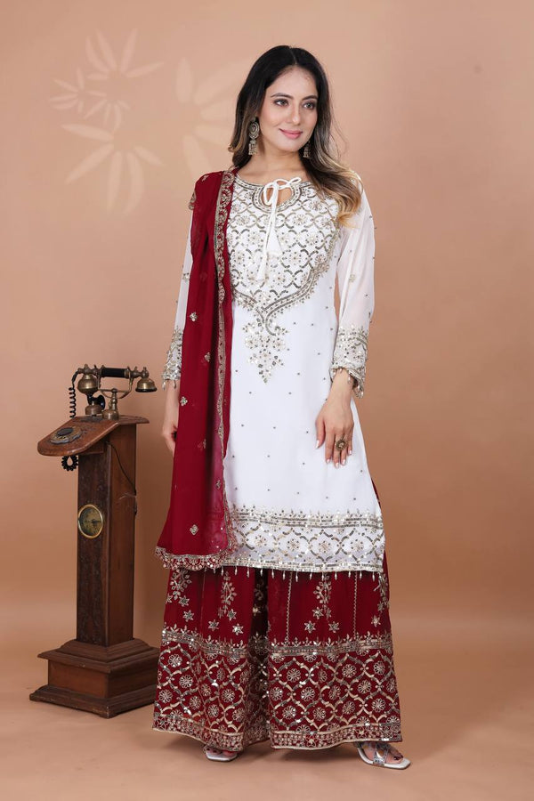 Fabulous Heavy Work White Color Suit With Red Sharara