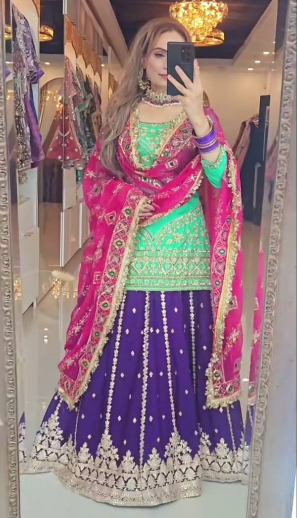 Stylish Rama Color Top With Navy Blue Lehenga
