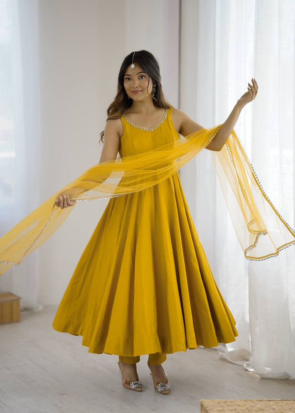 Ravishing Yellow Color Roman Silk Anarkali Suit